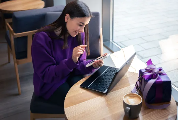 Freelancer reviewing Upwork Connects costs and promo options on a laptop